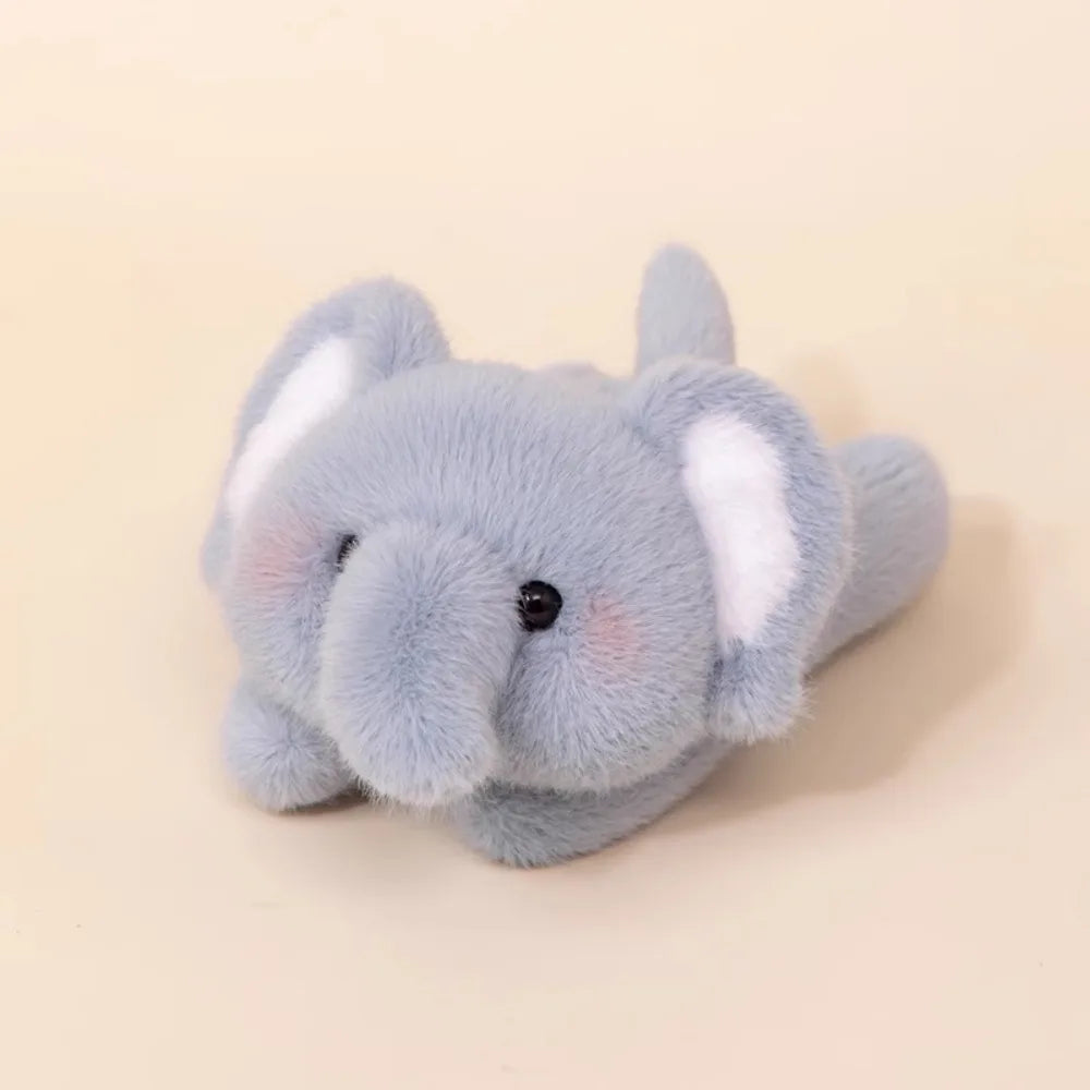 Liggande elefant (17 cm)